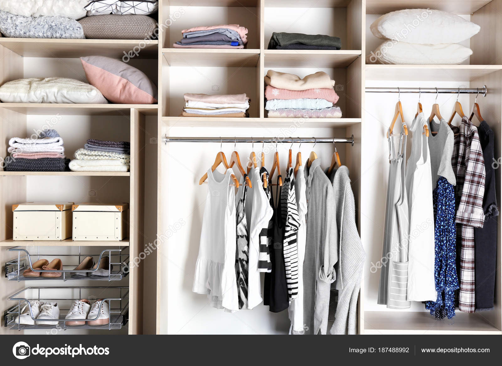 Large Wardrobe Closet With Different Clothes And Home Stuff