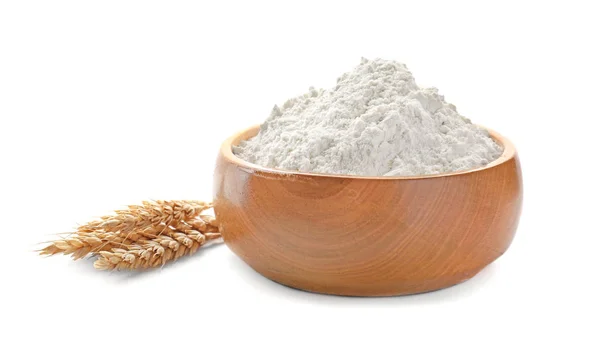 Bowl with wheat flour and spikelets on white background — Stock Photo, Image