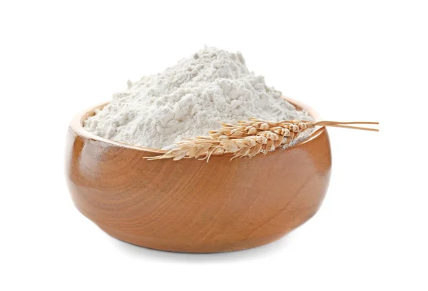 Bowl with wheat flour and spikelets on white background — Stock Photo, Image