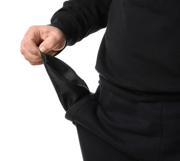 Poor man showing empty pocket on white background — Stock Photo, Image