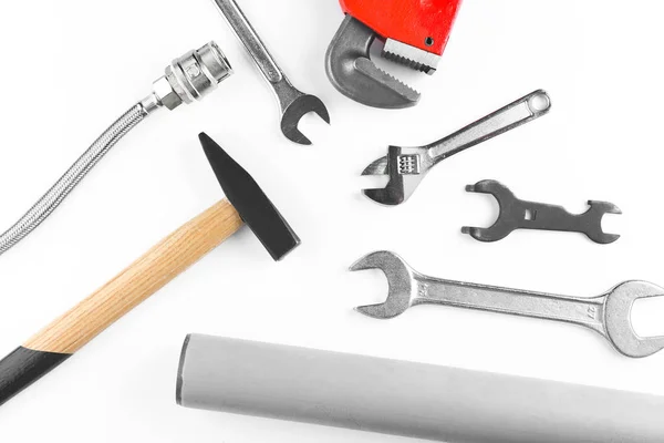 Plumbers items on white — Stock Photo, Image