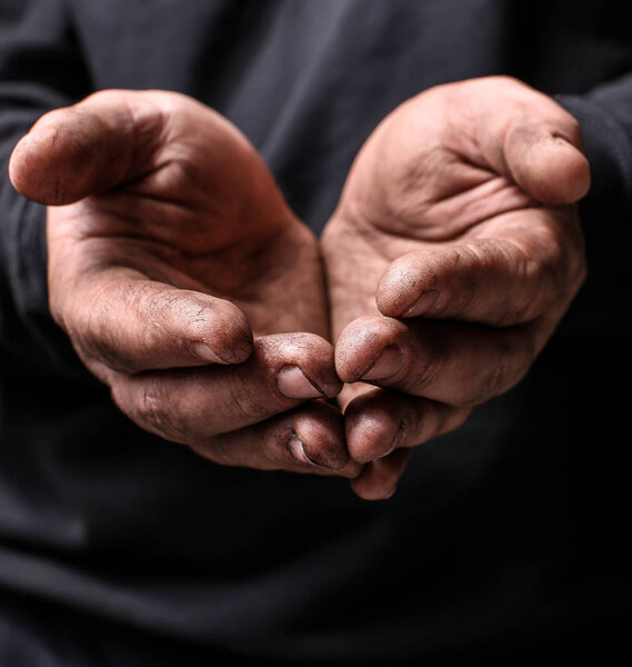 Poor man begging for money, closeup