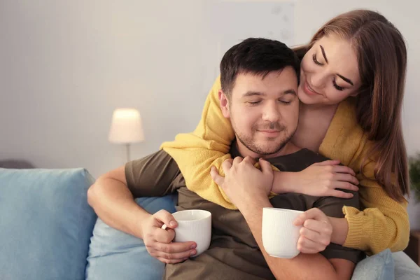 Cute lovely couple drinking tea at home — Stock Photo, Image