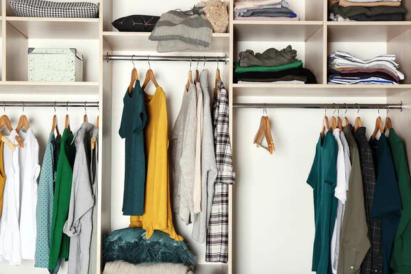 Large wardrobe closet with different clothes and home stuff — Stock Photo, Image