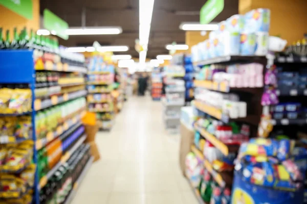 Interior of modern supermarket, blurred view — Stock Photo, Image