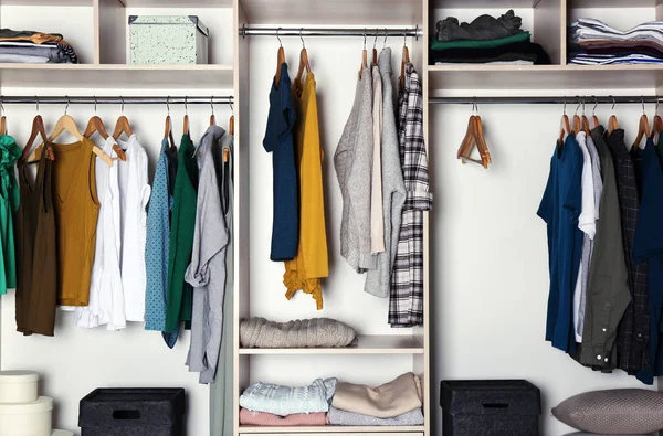 Large wardrobe closet with different clothes — Stock Photo, Image