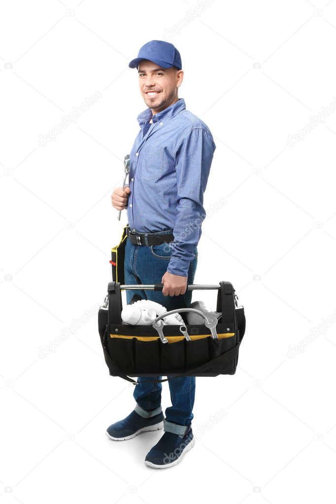 Plumber with tool bag and wrench on white background