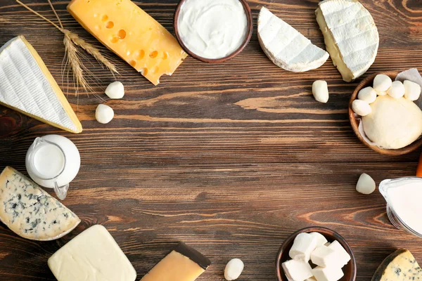 Fresh dairy products on wooden background — Stock Photo, Image