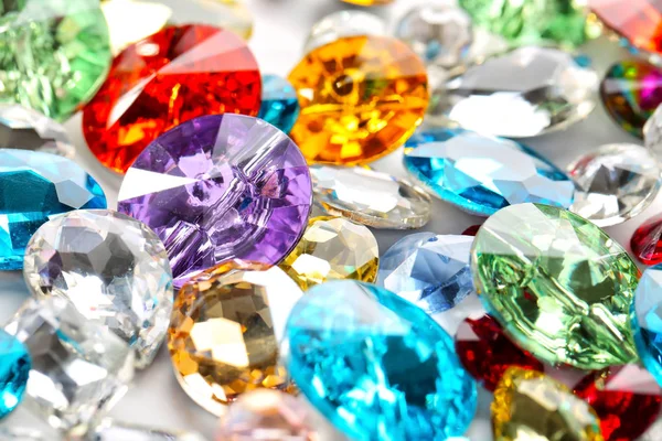 Colorful precious stones for jewellery on table