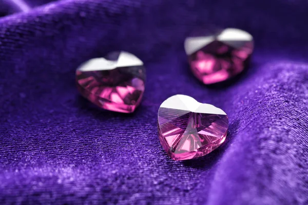 Precious stones for jewellery on purple velvet — Stock Photo, Image