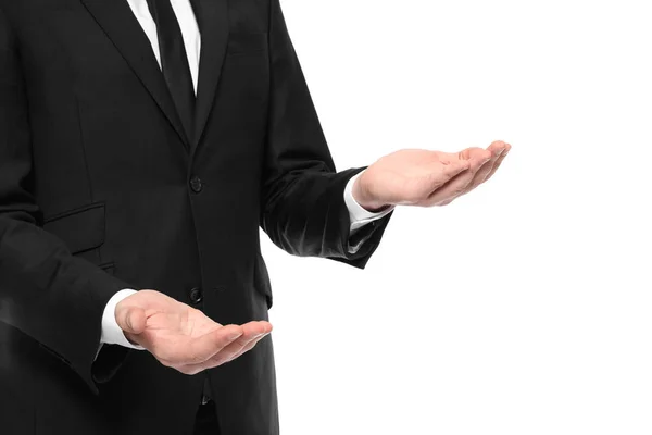 Young businessman showing balance gesture on white background — Stock Photo, Image