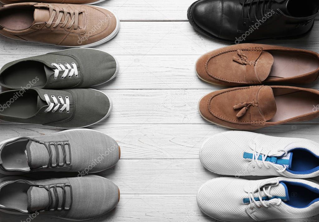 Different male shoes on light background