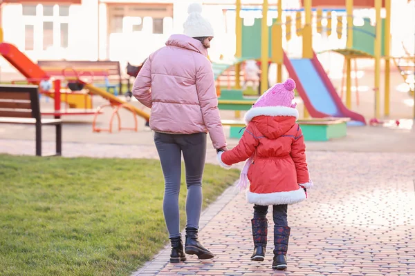 Woman with little girl outdoors. Child adoption — Stock Photo, Image