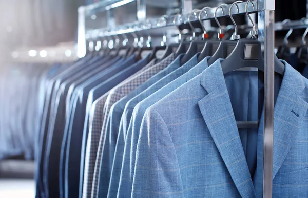 Rack with suit jackets — Stock Photo, Image