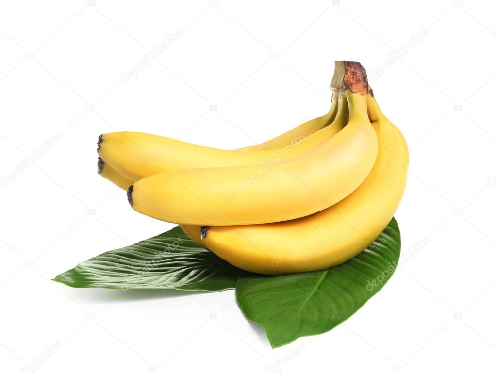 Fresh ripe bananas with leaves on white background