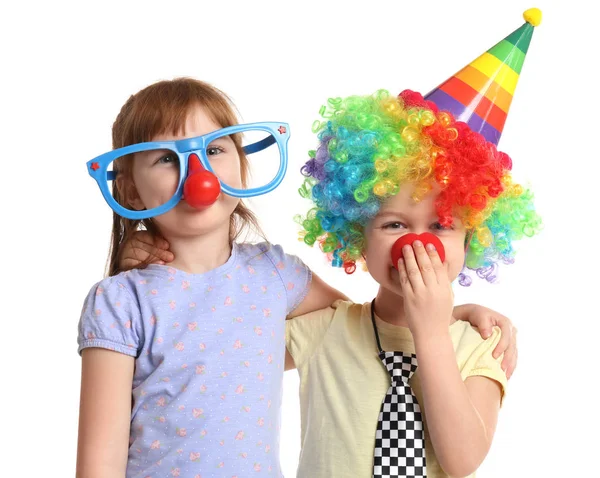 Schattig weinig kinderen in grappige vermomming op witte achtergrond. April fool's day viering — Stockfoto