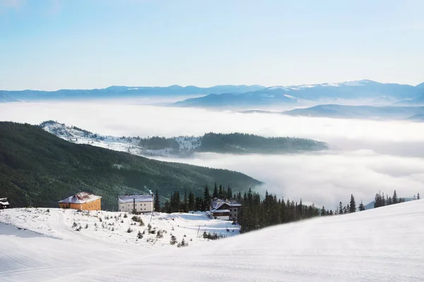 stock image Snowy ski resort in mountains on winter day