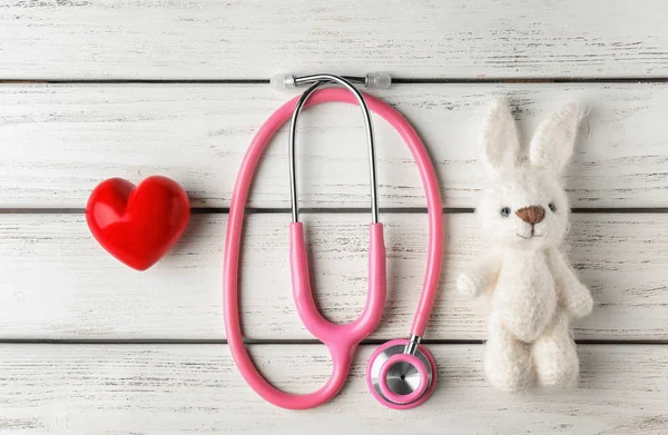 knitted bunny, small heart and stethoscope