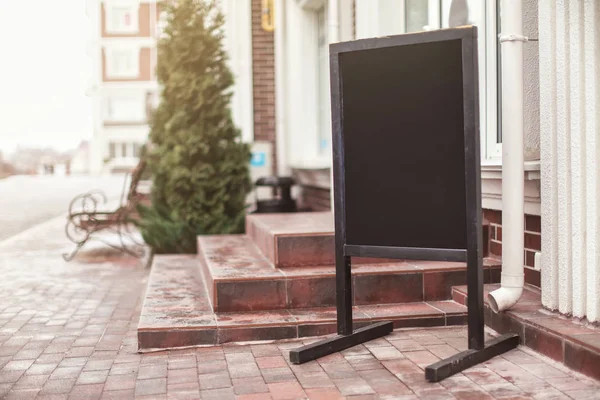 Advertising board on street — Stock Photo, Image