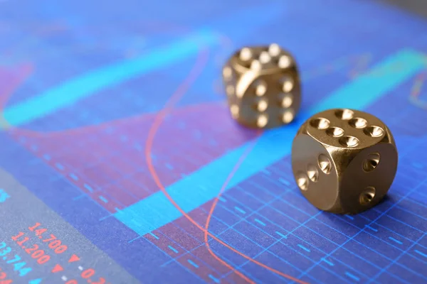 Dices on stock data graph — Stock Photo, Image