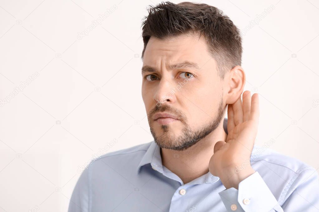 Mature man with hearing problem