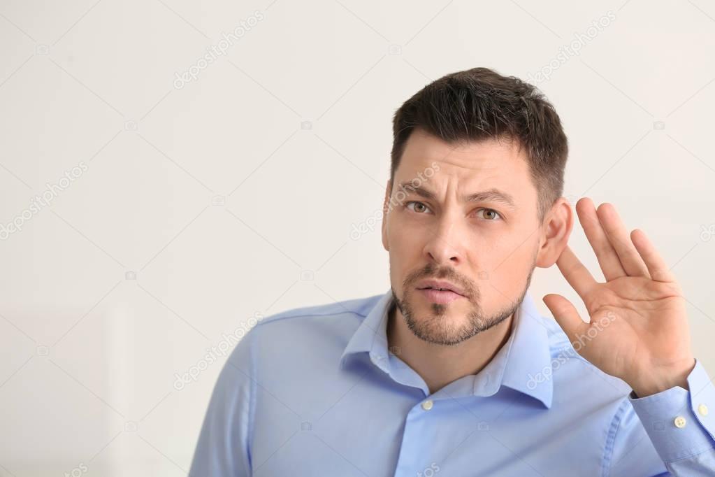 Mature man with hearing problem