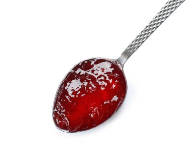 Beyaz arka planda tatlı reçelli kaşık