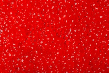 Arka plan olarak kırmızı havyar yakın çekim