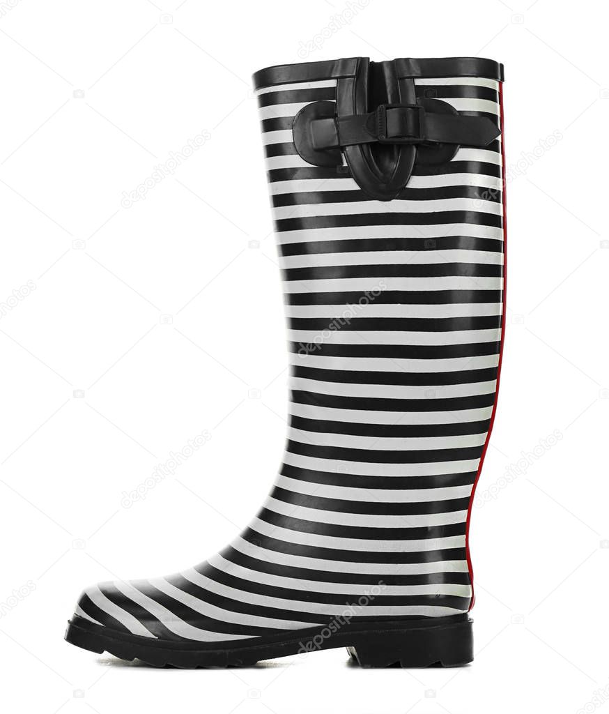 Female rubber boot on white background