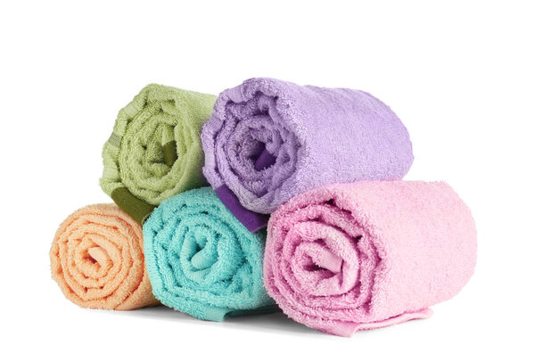 Clean rolled towels on white background. Laundry day