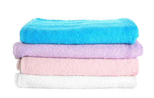Stack of clean towels on white background. Laundry day