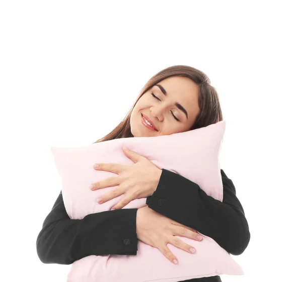 Young businesswoman with pillow on white background — Stock Photo, Image