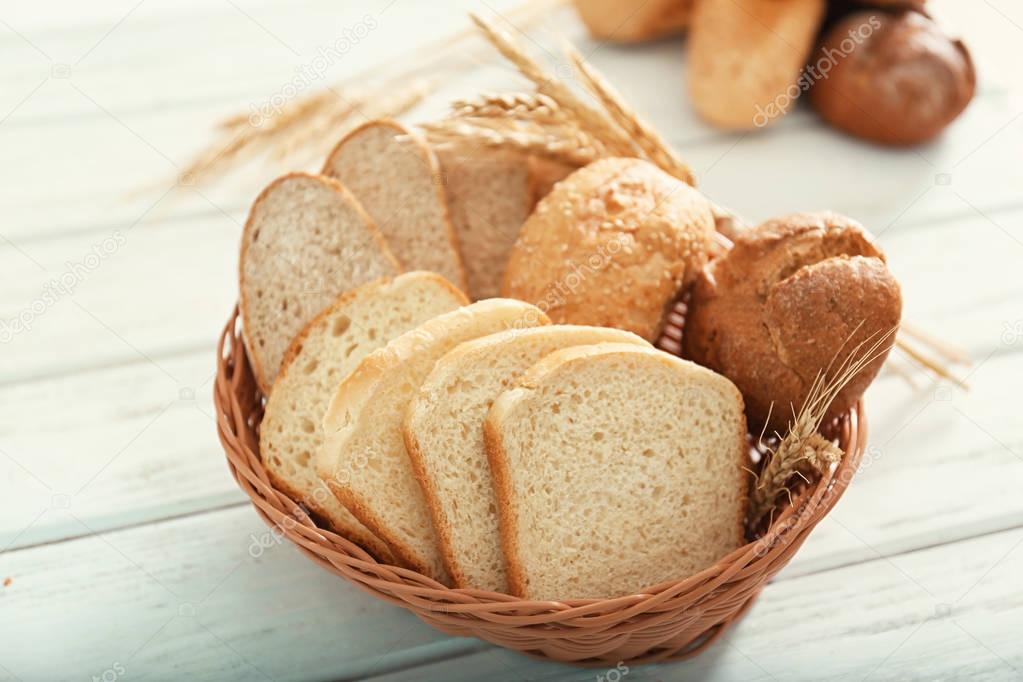 Basket with bread products on table