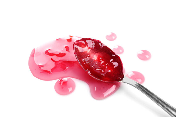 Spoon with sweet jam on white background