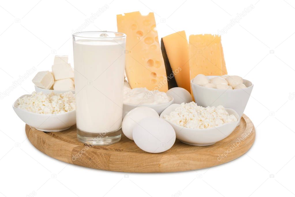 Fresh dairy products and eggs on white background