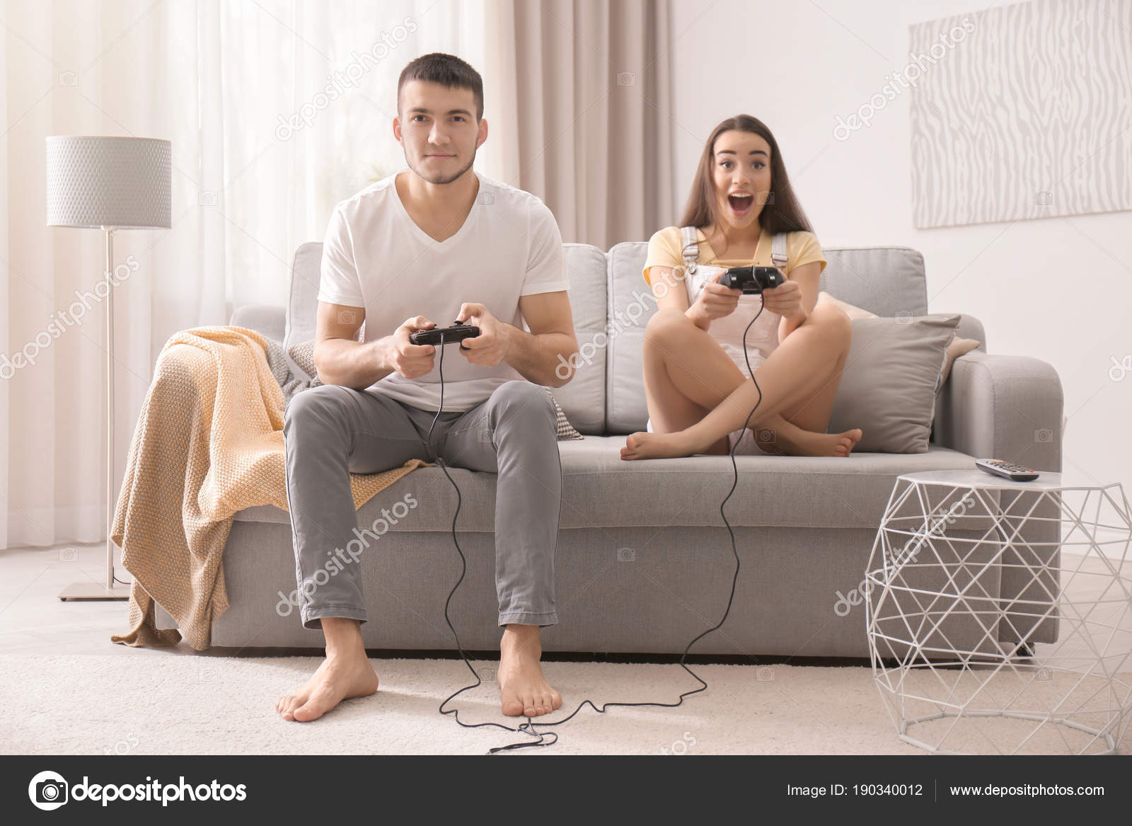 Couple Playing Video Game - Stock Photo - Masterfile - Premium