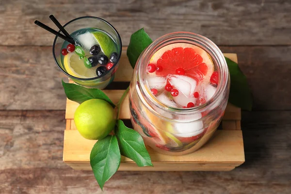 Tasty Lemonade Citrus Fruits Berries Glassware Wooden Crate — Stock Photo, Image