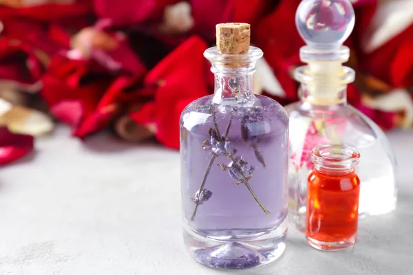 Bottles with perfume oil — Stock Photo, Image