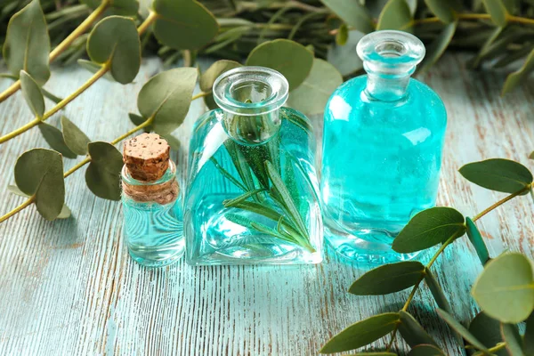 Bottles with perfume oil — Stock Photo, Image