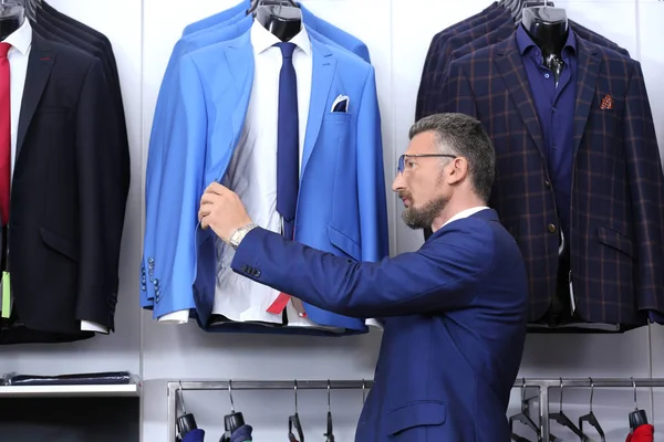 Handsome Man Choosing Suit Shop — Stock Photo, Image