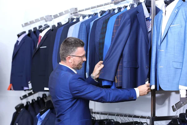 Handsome Man Choosing Suit Shop — Stock Photo, Image