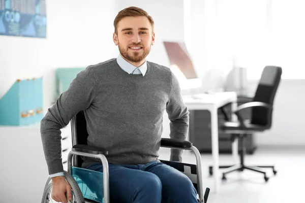 Young man in wheelchair — Stock Photo, Image