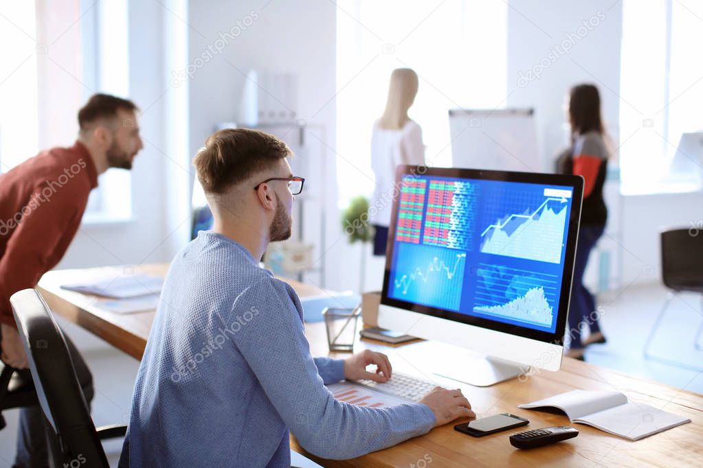 Man working with stock data  