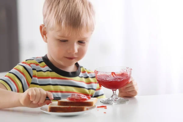 Cute Little Boy Spreading Jam Toast Home — Stock Photo, Image