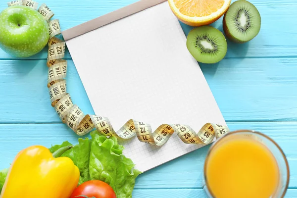 Blank notebook and healthy food — Stock Photo, Image