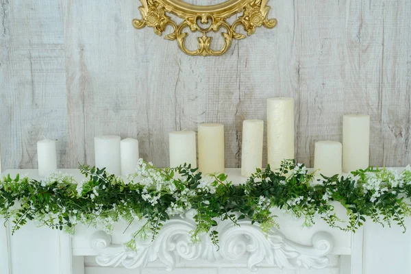 White Decorative Fireplace Candles Wooden Wall Floral Decoration White Flowers — Stock Photo, Image