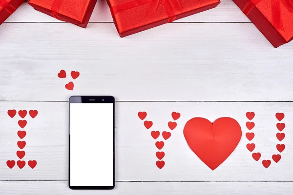 Bovenaanzicht Van Mobiele Smartphone Met Witte Leeg Scherm Rode Geschenkdozen — Stockfoto