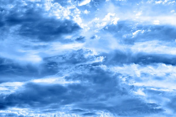 Classic blue background. Sky with clouds, copy space. — Stock Photo, Image