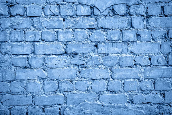 Grunge brick wall texture, copy space. CLassic blue background. — Stock Photo, Image