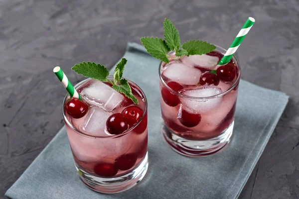 Fresh Cherry Lemonade Ice Mint Paper Straw Sparkling Glasses Gray — Stock Photo, Image